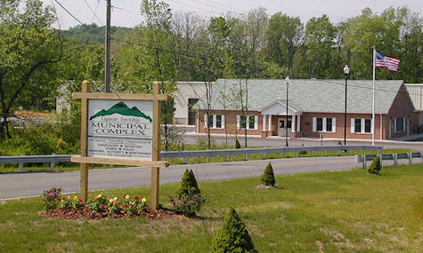 The Ligonier Township Municipal Complex sign and the municipal building behind it